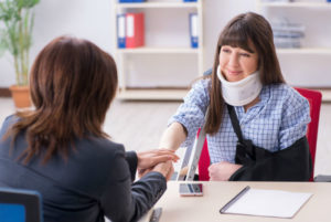 injury victim meeting with an oklahoma city workers's comp attorney