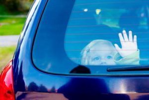 child inside a car