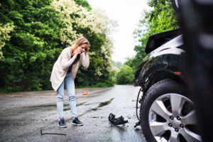 OKC Woman in hit-and-run accident realizing the damage to her vehicle