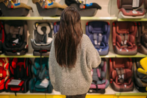 woman choosing a safe carseat