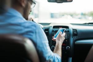 man texting and driving in oklahoma city