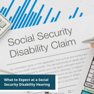 social security disability claim forms with eyeglasses nd pen